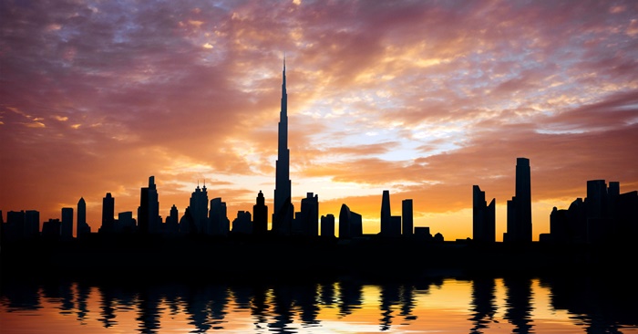 Beautiful beach and sea at sunset in Dubai