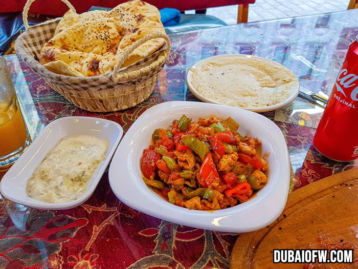 Pottery Kebab - popular dish with chicken, bell peppers and tomatoes cooked inside a clay pot