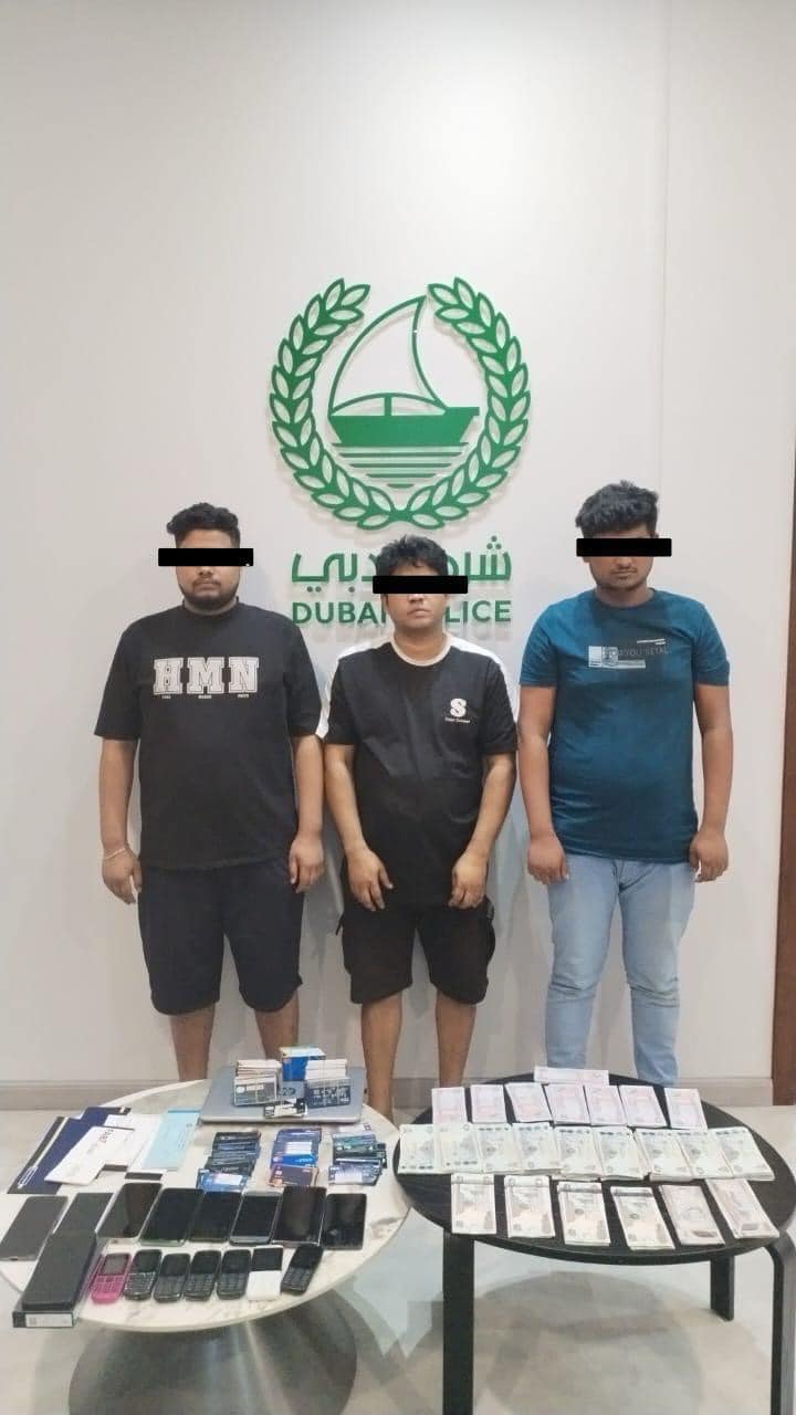 dubai police arrest phone bank scammers