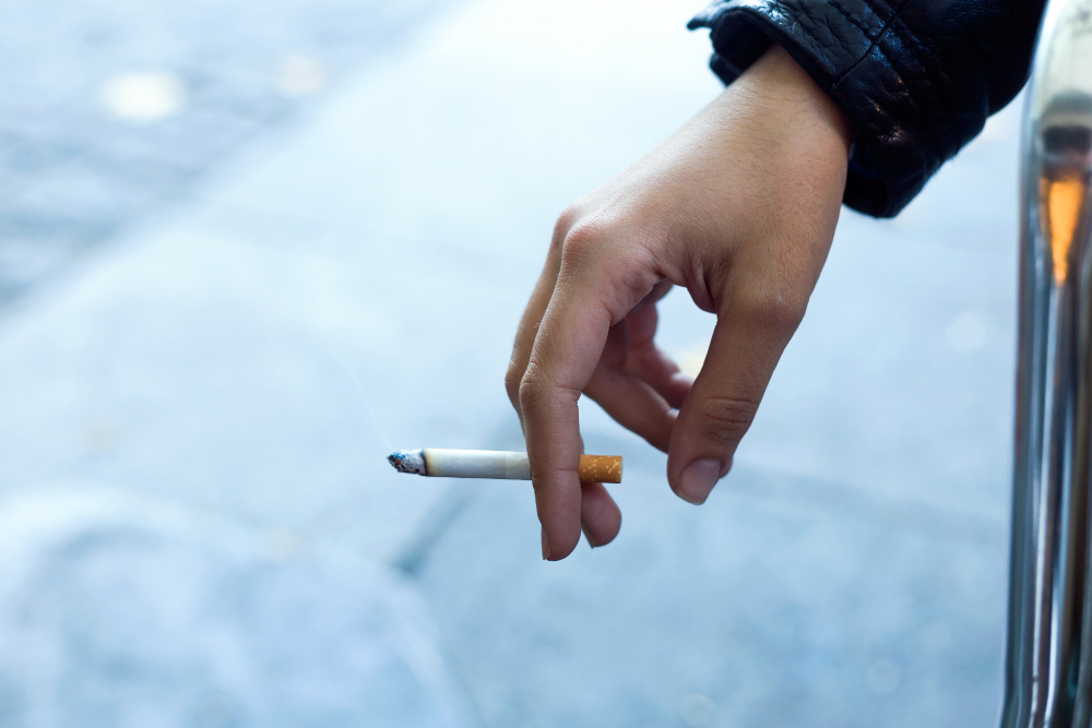 Smoking in cars can ignite flammable materials like dry carpeting, paper, or crumbs if a lit cigarette falls.